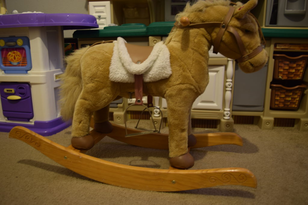 Chrisha Playful plush rocking horse with sound and movement