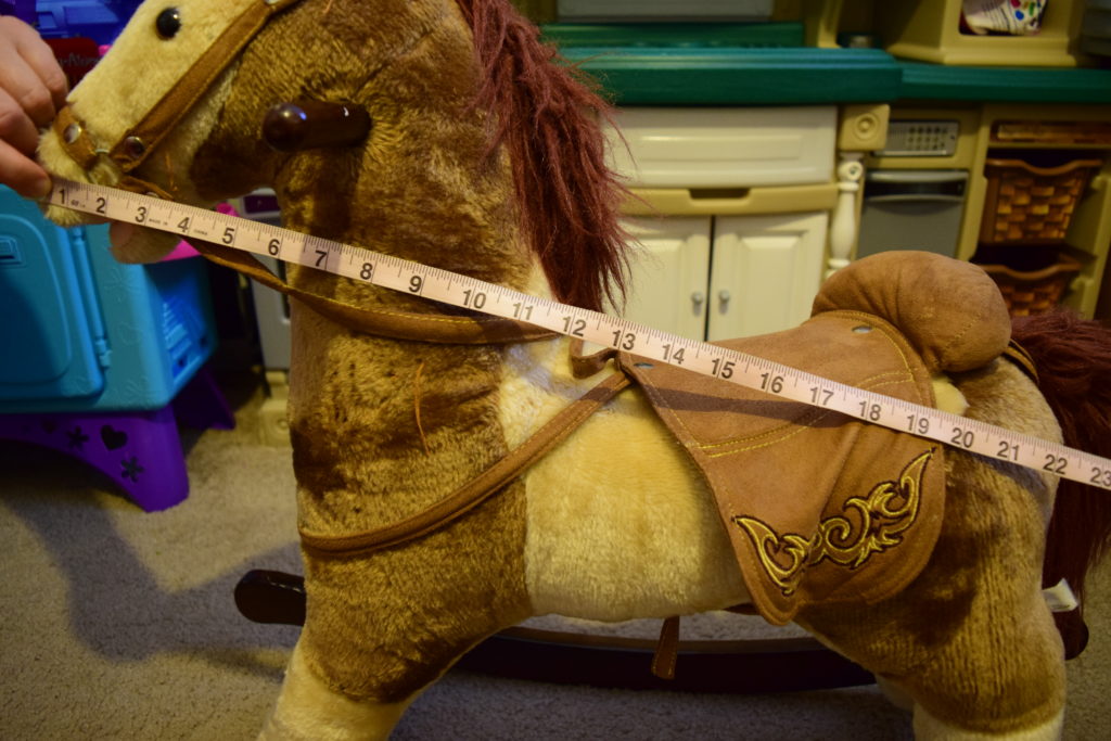 The length of Cowboy plush rocking horse 