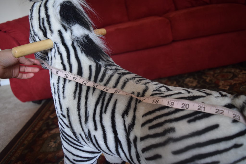 Happy Trails plush zebra rocking horse measures 23 inches long